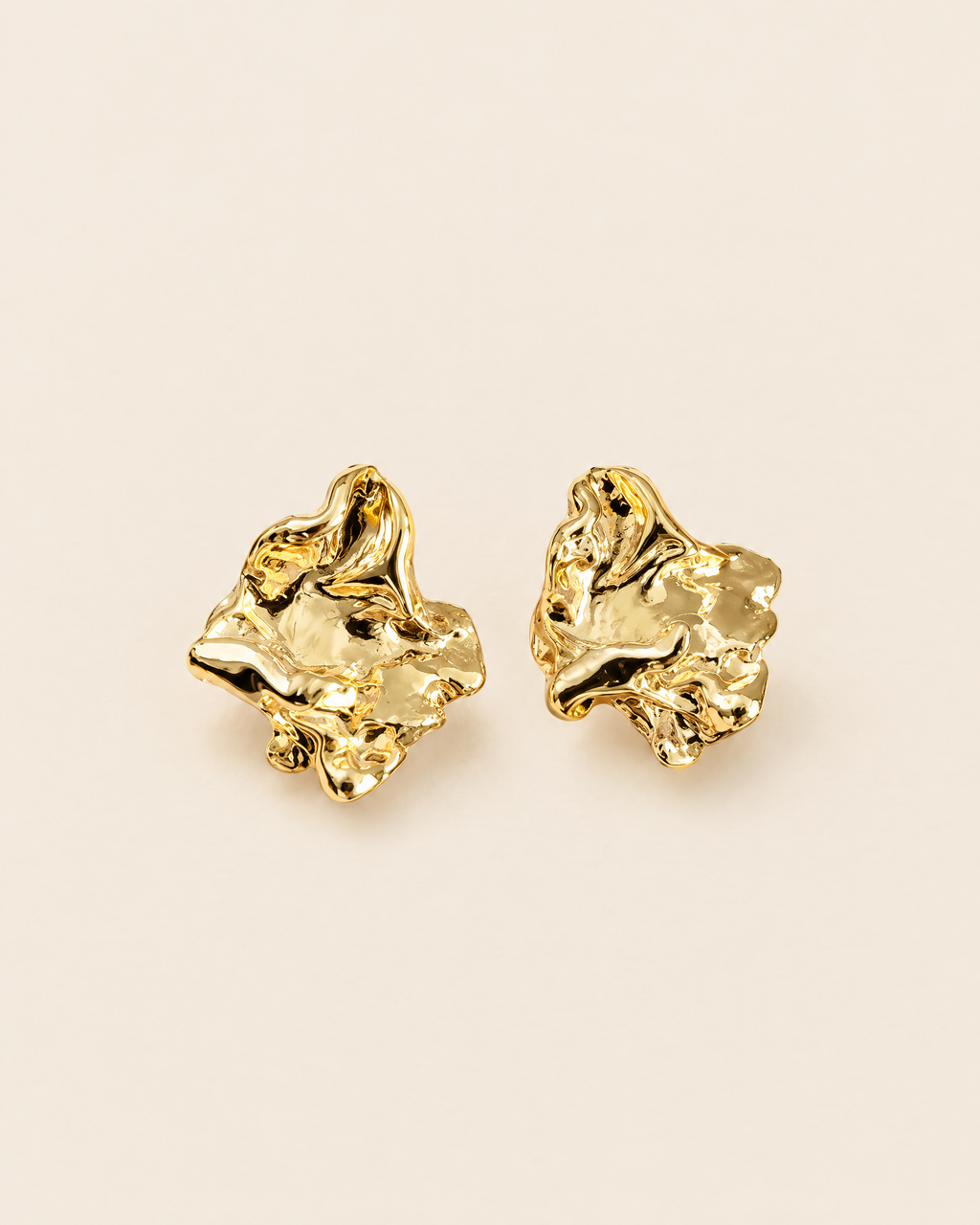 Molten Gold Statement Studs on cream