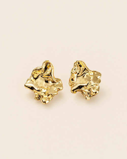 Molten Gold Statement Studs on cream