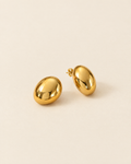 Vintage Gold Dome Earrings on cream