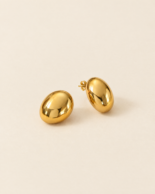 Vintage Gold Dome Earrings on cream